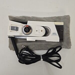 Lewis N. Clark‎ Model IR100 Dual Voltage Steam & Dry Travel Iron